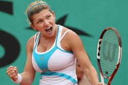 Simona Halep a spulberat-o pe italianca Errani